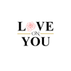 A typographic design reading 'LOVE ON YOU' on a plain white background. The letter O in LOVE is replaced by a red rose outline, and thin gold horizontal lines flank the word 'ON'.